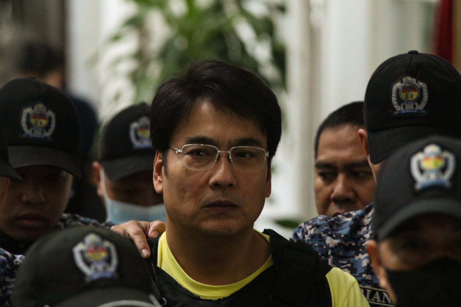 Former Senator Ramon Bong Revilla Jr. leaves the Department of Justice in Manila on Thursday, 12 February 2026, following a preliminary probe into plunder allegations involving anomalous flood control projects.