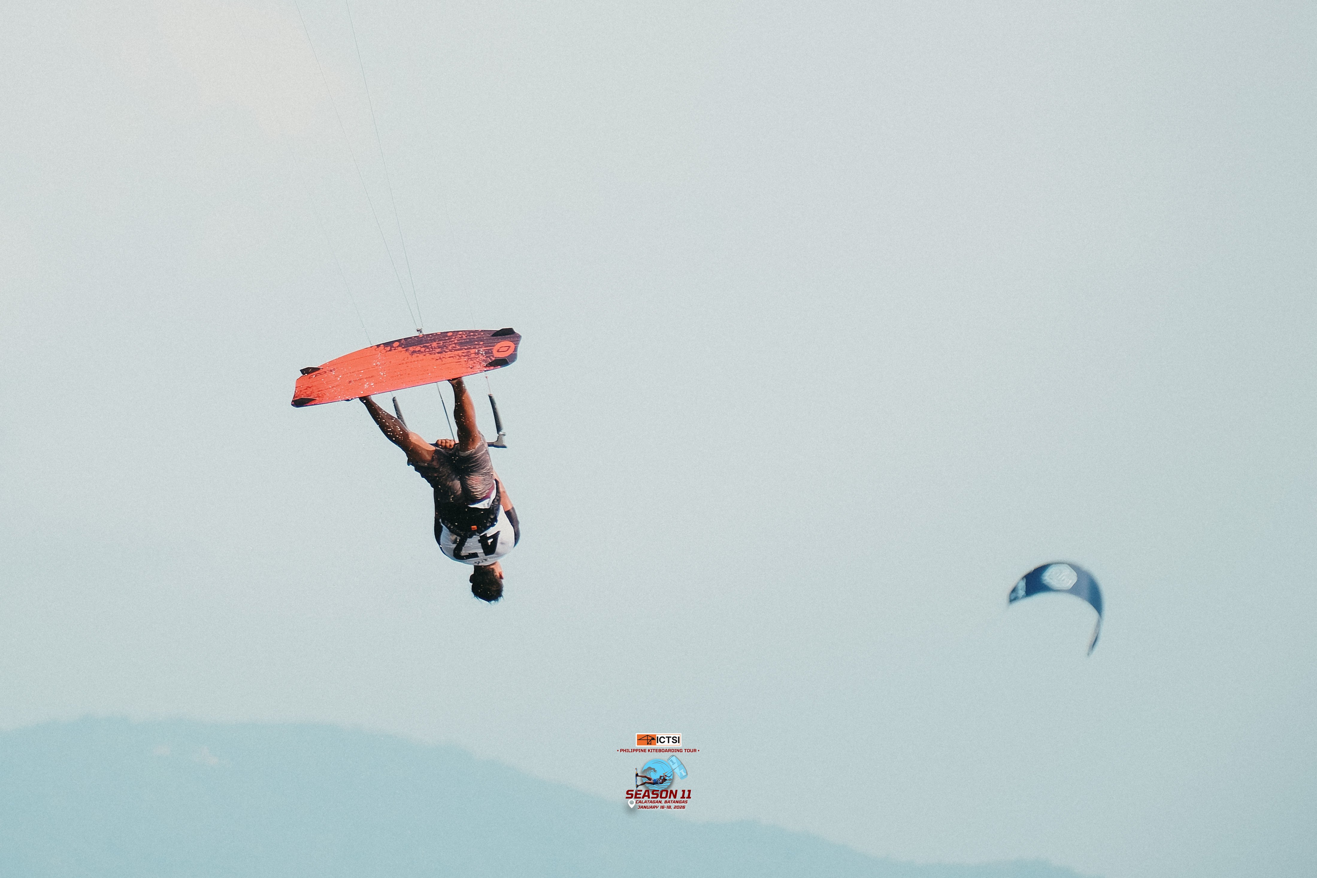 NAPRICHIT Pudla defies gravity with a jaw-dropping backflip to rule the freestyle division of the ICTSI-Philippine Kiteboarding Tour Season 11 in Batangas.