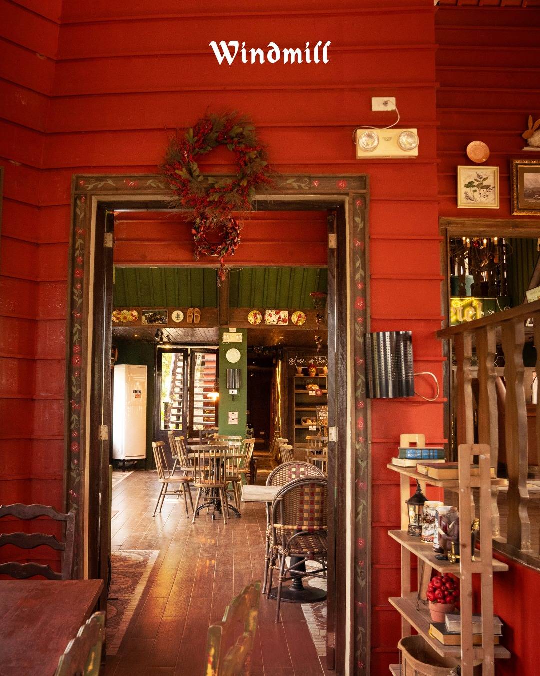 EXPOSED wooden beams and wood‑panelled walls in rust and olive color provide the relaxed feeling of a Swiss home.