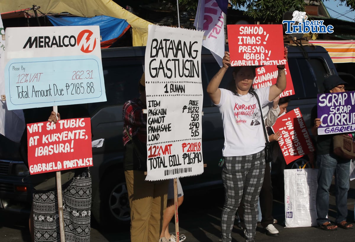 (February 13 2026) On the eve of valentines day, the national women alliance GABRIELA launched its fierce 2025 campaign to scrap the value added Tax (VAT), by staging a militant protest at Commonwealth Public market in Quezon City, on Friday February 13 2026, to expose how systemic corruption and a regressive tax system conspire to rob the poor. Photo/Analy Labor