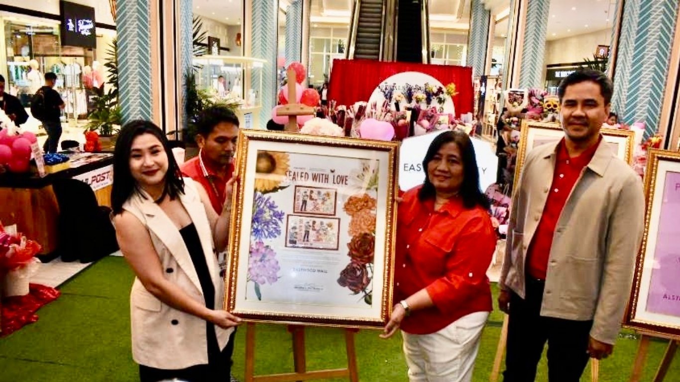 MS. Krishield Quiogue (left), general manager of Eastwood City; Ms. Olivia M. Valderama (second from left), area director for Mega Manila of the Philippine Postal Corporation; and Hon. Gilbert B. Javier (third from left), acting assistant postmaster general for operations of PHLPost, lead the launch of the 2026 ‘Sealed with Love’ Valentine’s Day Special Stamps at Eastwood Mall in Quezon City on 12 February.