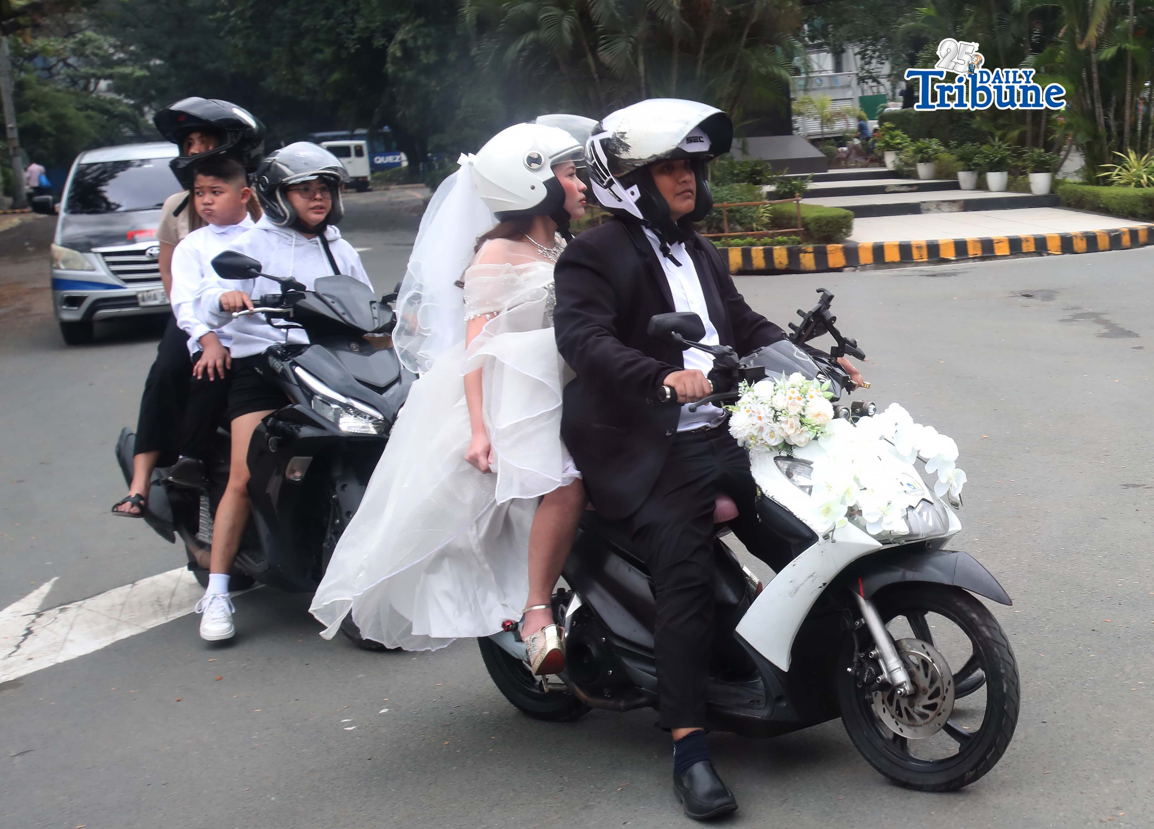 Pride Ride: LGBTQ+ couple ride motorcycle 