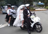Pride Ride: LGBTQ+ couple ride motorcycle