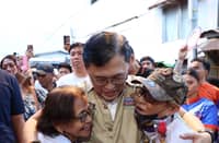 SENATOR Christopher “Bong” Go meets displaced residents in Barangay 76-A to assess needs and provide relief.