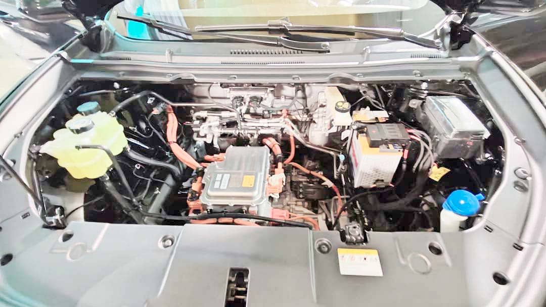 BATTERY pack and electric motor components sit under the hood of the Limo Green MPV.