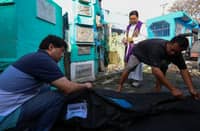 Fr. Flavie Villanueva leads exhumation of EJK victims in Manila.