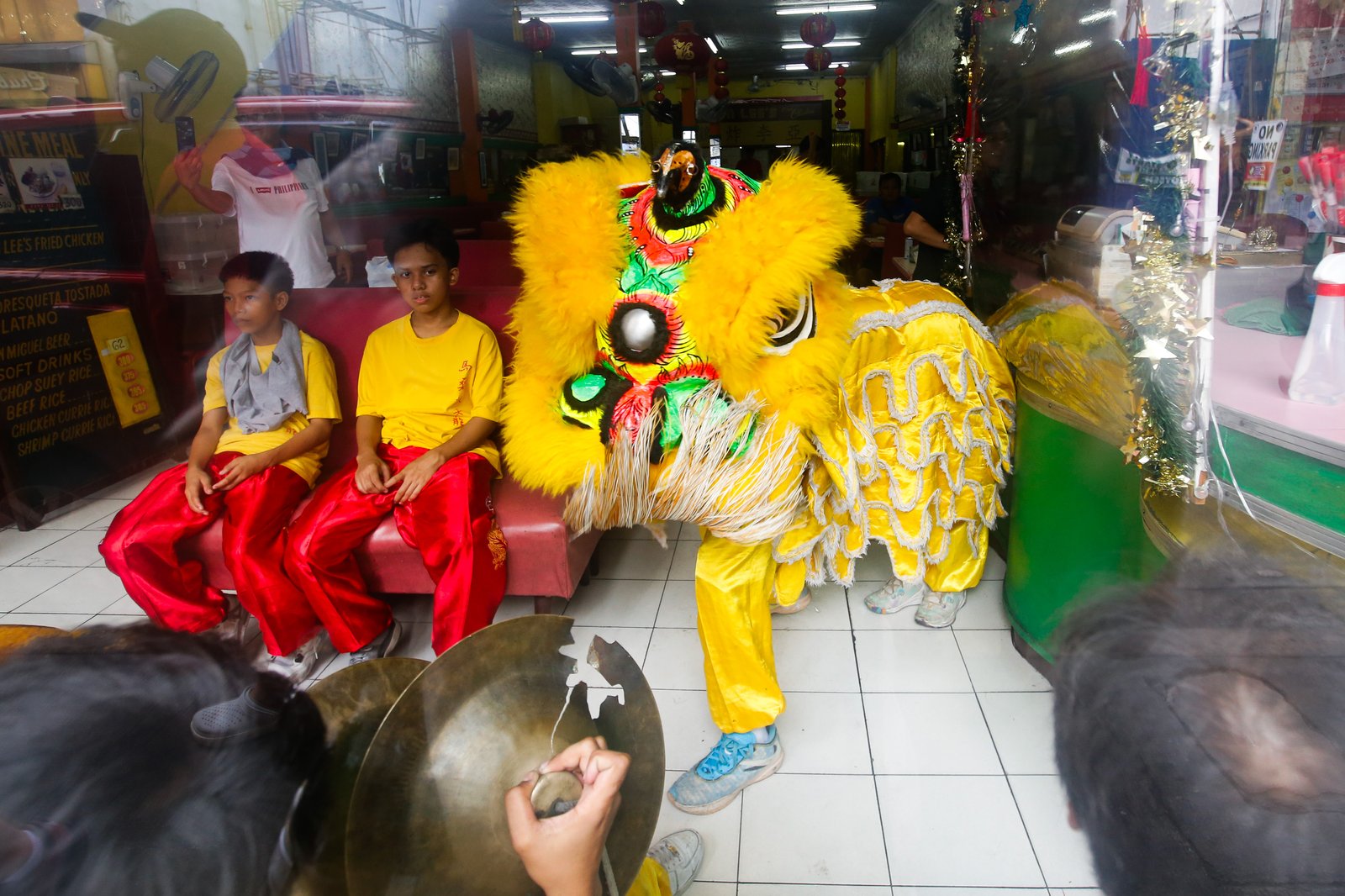 Junior members of the Masangkay Sky Dragon and Lion Dance Club make their rounds through Manila’s Binondo District as the community celebrates the Year of the Horse. Hosting a lion dance is believed to ward off evil spirits, bring good luck, and usher in prosperity for the year ahead.