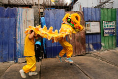 Junior lion dancers making rounds at Binondo