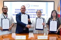 GLOBAL Aerospace Technology Philippines Inc. Pesident Jason Carl Tyas (left, center) and Philippine Economic Zone Authority director general Tereso Panga (second from right) shake hands after their signing off on the Registration Agreement of Global Aerospace Technology Philippines as an ecozone export enterprise at the Cavite Technopark–Special Economic Zone in Naic, Cavite.