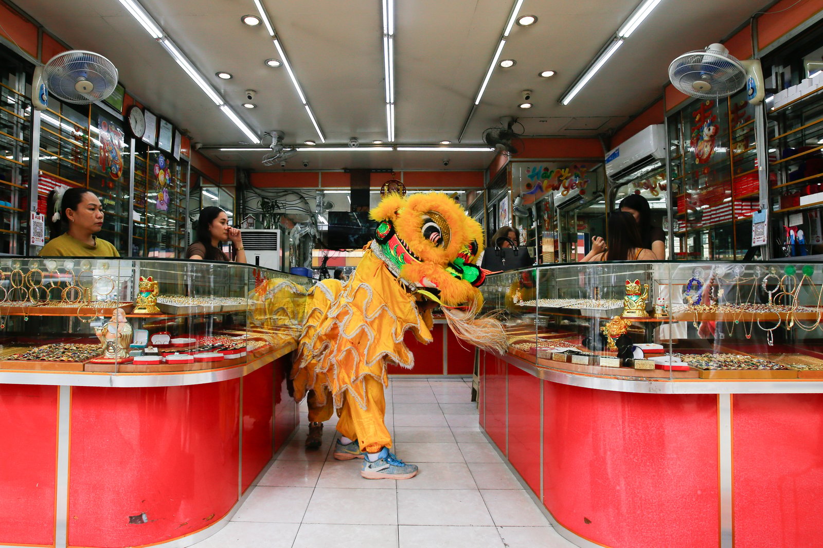 Junior members of the Masangkay Sky Dragon and Lion Dance Club make their rounds through Manila’s Binondo District as the community celebrates the Year of the Horse. Hosting a lion dance is believed to ward off evil spirits, bring good luck, and usher in prosperity for the year ahead.