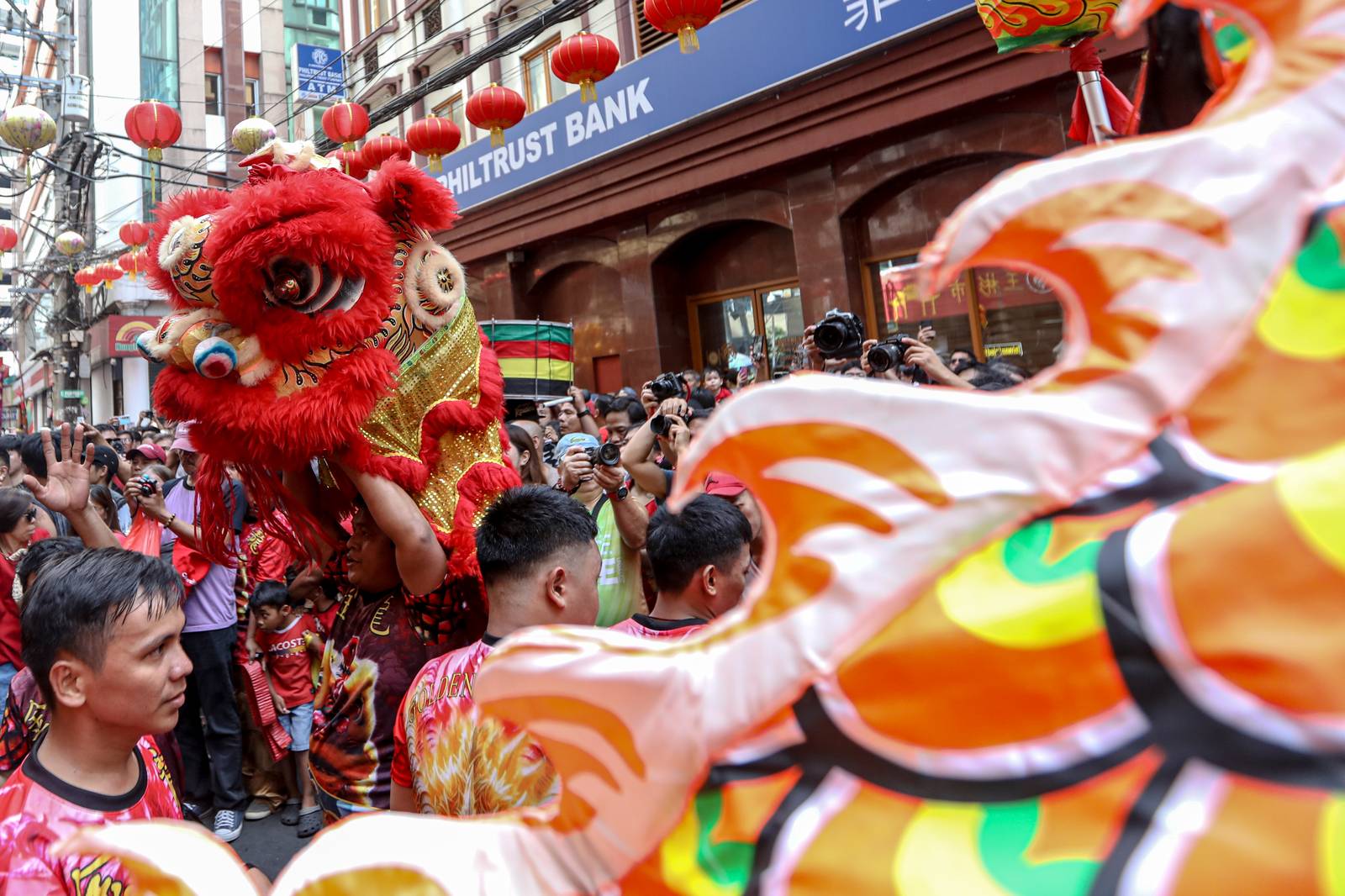 Dragon dancers are seen amid crackling fireworks outside a local supermarket in Chinatown, Binondo, Manila, in celebration of the Lunar New Year on Tuesday, 17 February 2026.| Aram Lascano/DAILY TRIBUNE