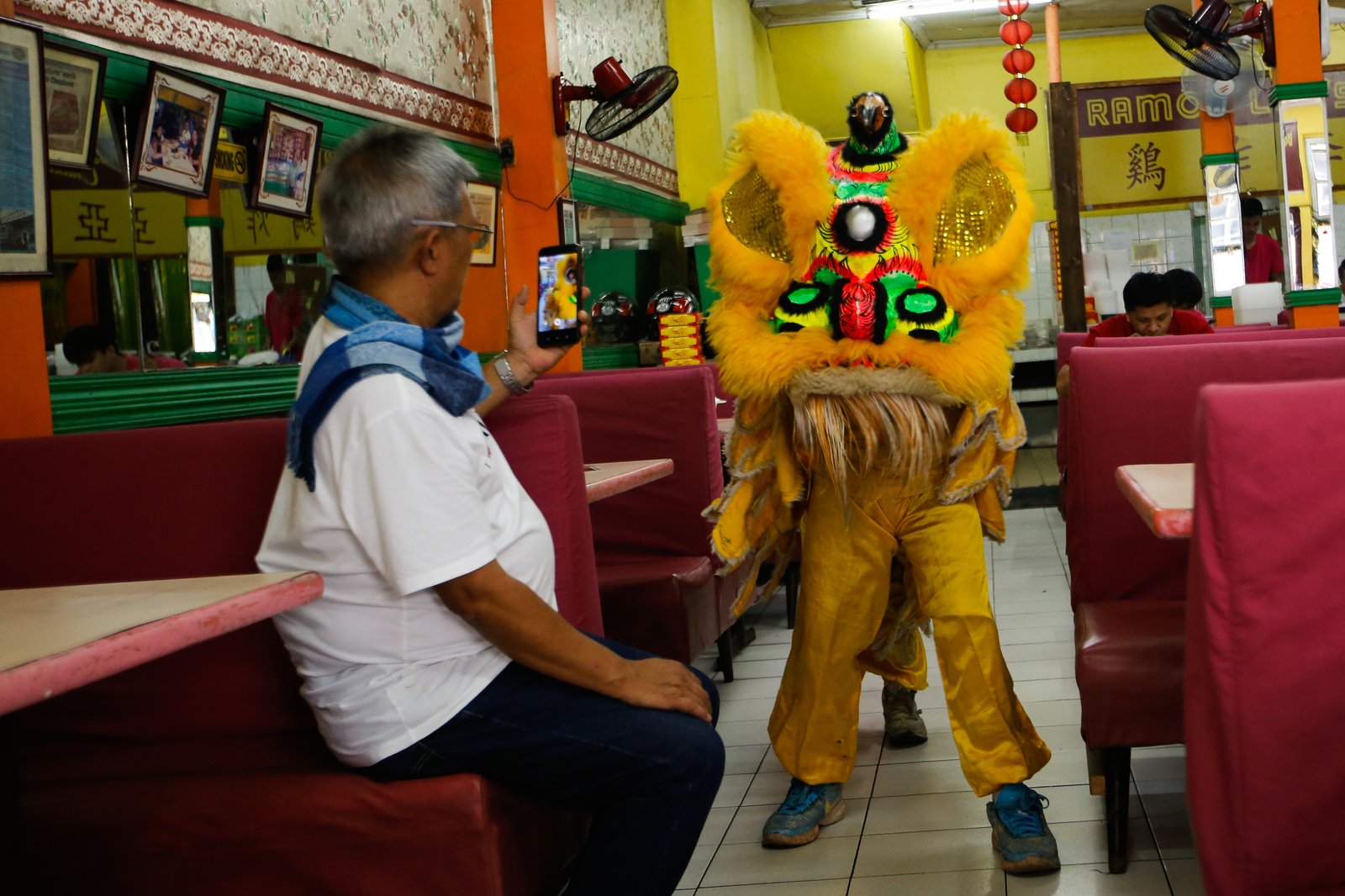 Junior members of the Masangkay Sky Dragon and Lion Dance Club make their rounds through Manila’s Binondo District as the community celebrates the Year of the Horse. Hosting a lion dance is believed to ward off evil spirits, bring good luck, and usher in prosperity for the year ahead.
