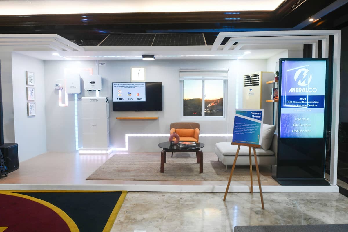 SHOWCASE of innovation and community partnership. Meralco featured various innovations and community partnerships in an exhibit that highlights its support for the National Energy Agenda. Seen in the photo are an e-trike charging station in Valenzuela City, and technology demonstrations including smart-home energy flow simulations.