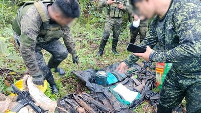 State troops recover arms cache
