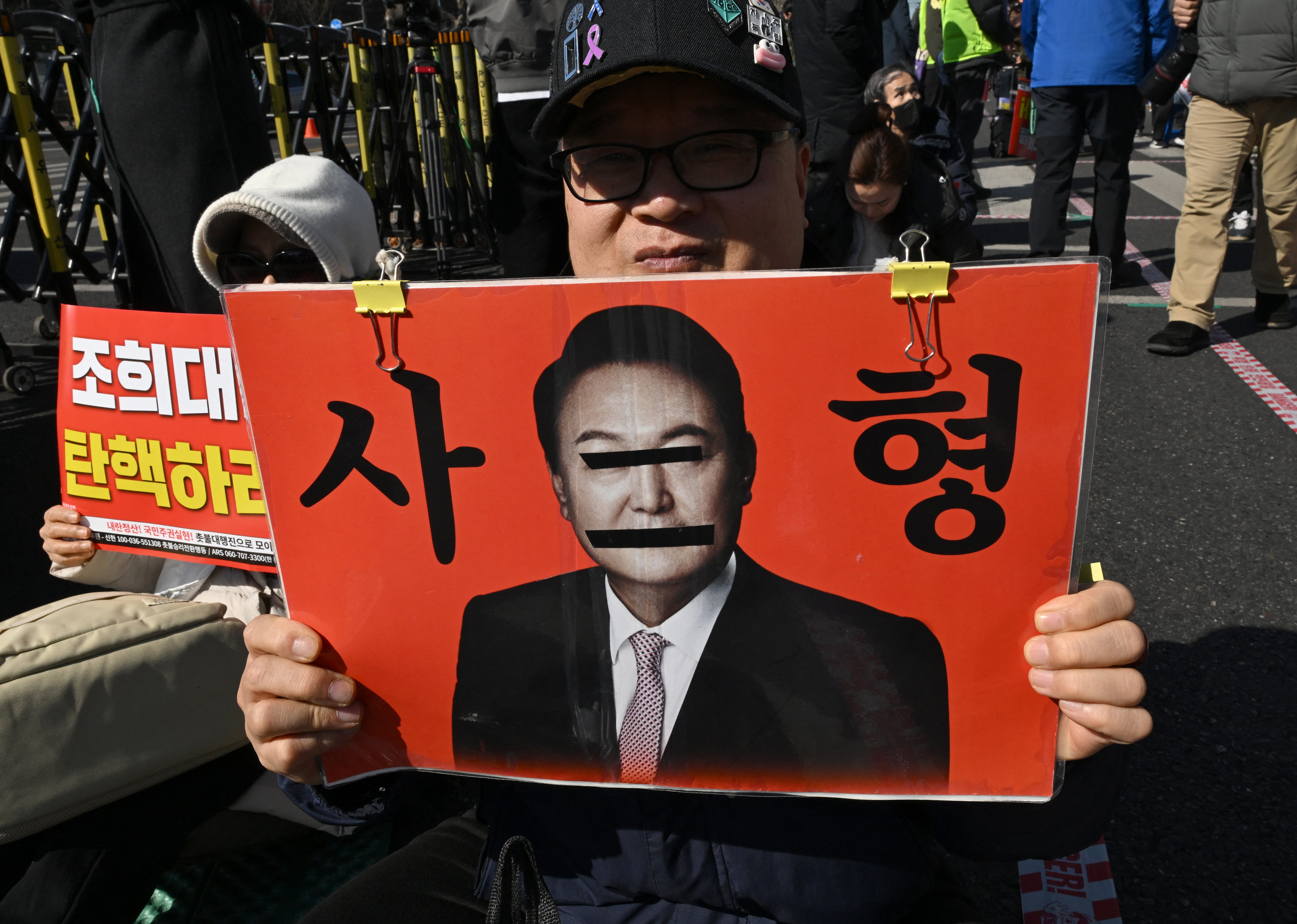 Ex-South Korea leader Yoon gets life in prison for insurrection