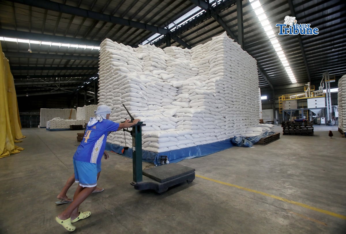 (February 19 2026) Personnel at National Food Authority (NFA) weighing the 20 peso per kilo a President Ferdinand Marcos Jr. rice program, before the beneficiaries arrive to buy rice at NFA warehouse in Valenzuela City, on Thursday February 19 2026, on February 20 the NFA will start an auction of 750, 000 sacks that have been stored at the warehouse in Valenzuela City. The minimum bid for stocks aged three to six months old will start at P25.16 per kilo. On the other hand, the minimum bid for rice stocks that are 18 months old is P22.52 per kilo. Photo/Analy Labor
