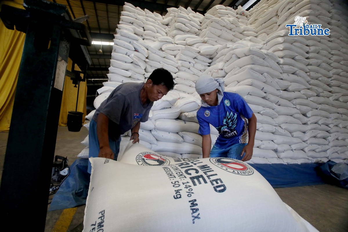 (February 19 2026) Personnel at National Food Authority (NFA) weighing the 20 peso per kilo a President Ferdinand Marcos Jr. rice program, before the beneficiaries arrive to buy rice at NFA warehouse in Valenzuela City, on Thursday February 19 2026, on February 20 the NFA will start an auction of 750, 000 sacks that have been stored at the warehouse in Valenzuela City. The minimum bid for stocks aged three to six months old will start at P25.16 per kilo. On the other hand, the minimum bid for rice stocks that are 18 months old is P22.52 per kilo. Photo/Analy Labor