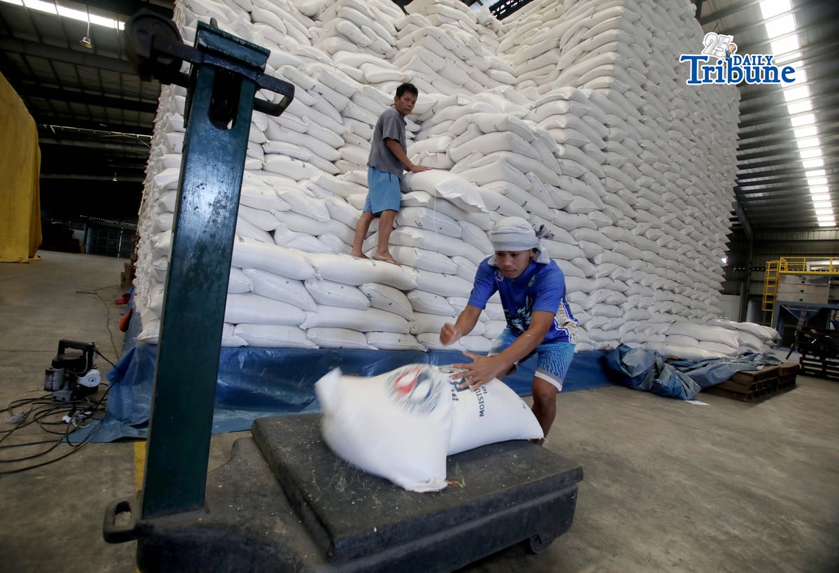 (February 19 2026) Personnel at National Food Authority (NFA) weighing the 20 peso per kilo a President Ferdinand Marcos Jr. rice program, before the beneficiaries arrive to buy rice at NFA warehouse in Valenzuela City, on Thursday February 19 2026, on February 20 the NFA will start an auction of 750, 000 sacks that have been stored at the warehouse in Valenzuela City. The minimum bid for stocks aged three to six months old will start at P25.16 per kilo. On the other hand, the minimum bid for rice stocks that are 18 months old is P22.52 per kilo. Photo/Analy Labor