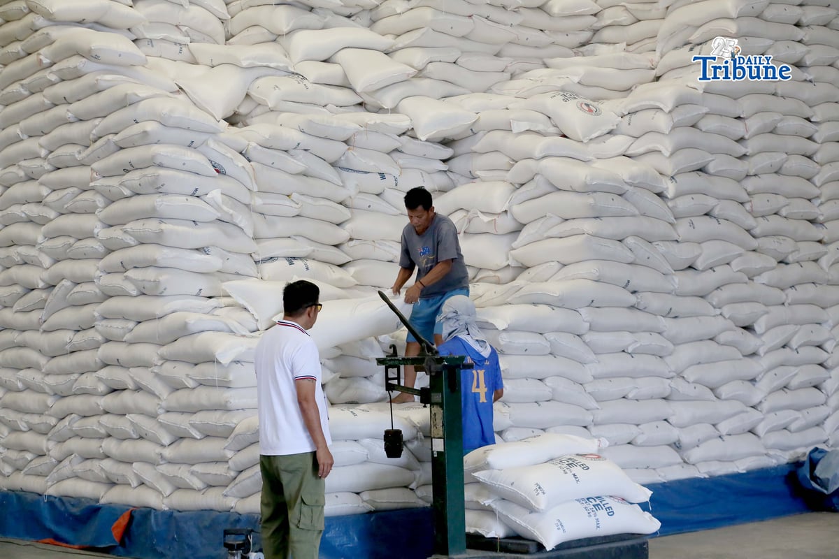 (February 19 2026) Personnel at National Food Authority (NFA) weighing the 20 peso per kilo a President Ferdinand Marcos Jr. rice program, before the beneficiaries arrive to buy rice at NFA warehouse in Valenzuela City, on Thursday February 19 2026, on February 20 the NFA will start an auction of 750, 000 sacks that have been stored at the warehouse in Valenzuela City. The minimum bid for stocks aged three to six months old will start at P25.16 per kilo. On the other hand, the minimum bid for rice stocks that are 18 months old is P22.52 per kilo. Photo/Analy Labor