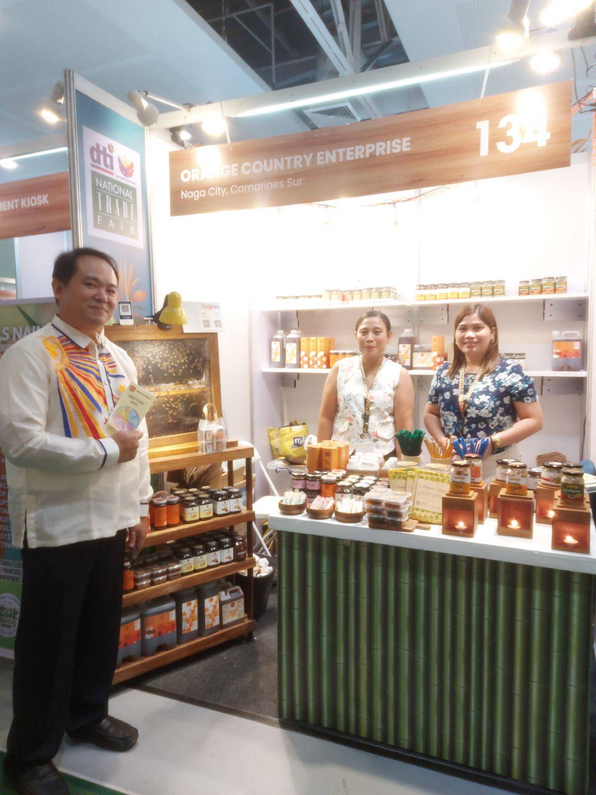 Larry Ong and his team at Orange Country Enterprises at the ongoing DTI National Trade Fair in SM Megamall.