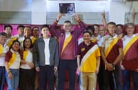 RENE ‘Bong’ Hawkins celebrates with Perpetual president Dr. Anthony Tamayo, vice president for Sports Anton Tamayo, and some of his former teammates and administration officials during his jersey retirement on Friday.