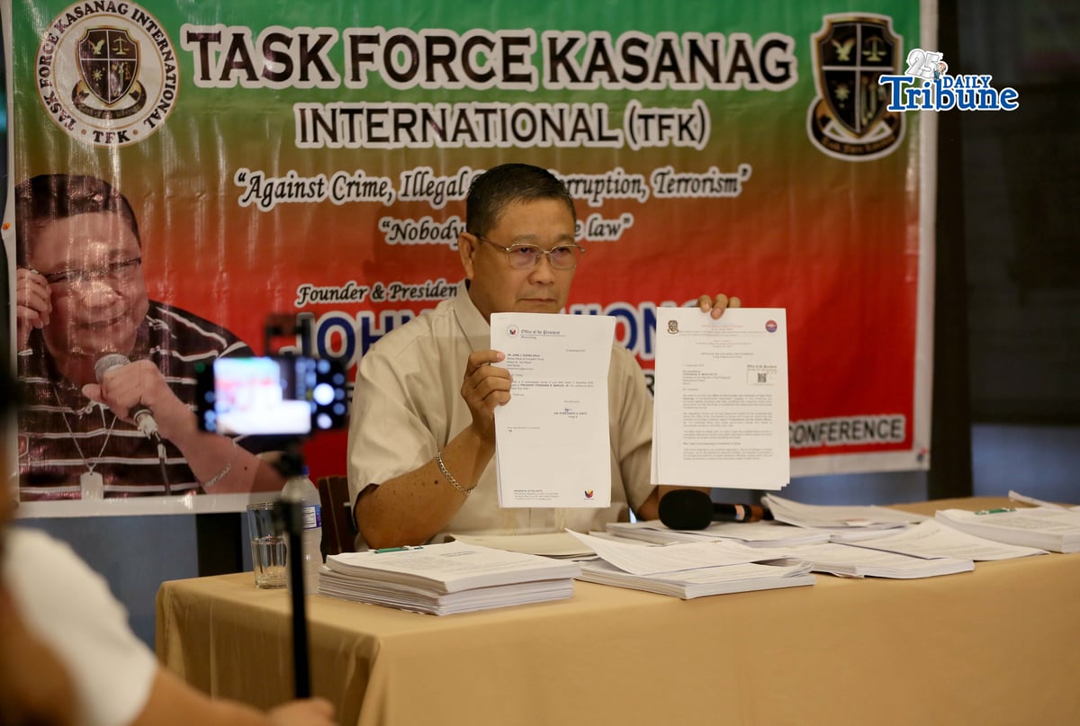 (February 21 2026) Task Force Kasanag (TFK) Founder John Chiong shows the ethics complaint filed at the Office of the President, by the group against House Committee on Public Works Chairperson and Surigao del Sur 1st District Representative Romeo Salazar Momo Sr. during press conference in Quezon City on Saturday February 21 2026. Photo/Analy Labor