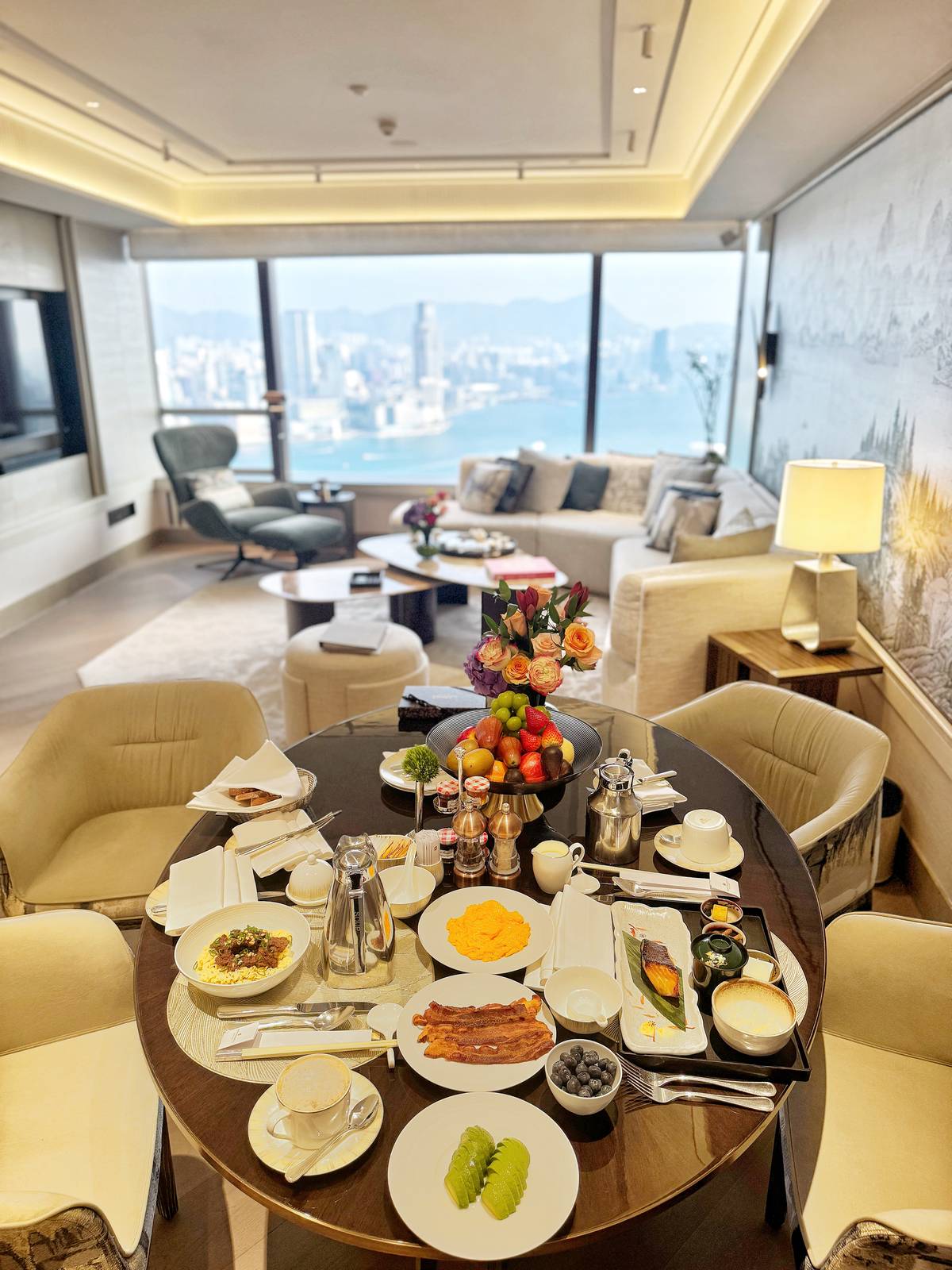 THE living room of the Hong Kong Suite offers panoramic views of Victoria Harbour, best enjoyed with in-room breakfast.