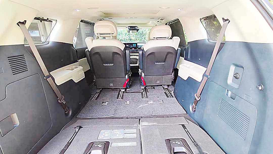 REAR cargo space opens up once the third-row seats fold flat, which handles luggage and golf bags with room left over.