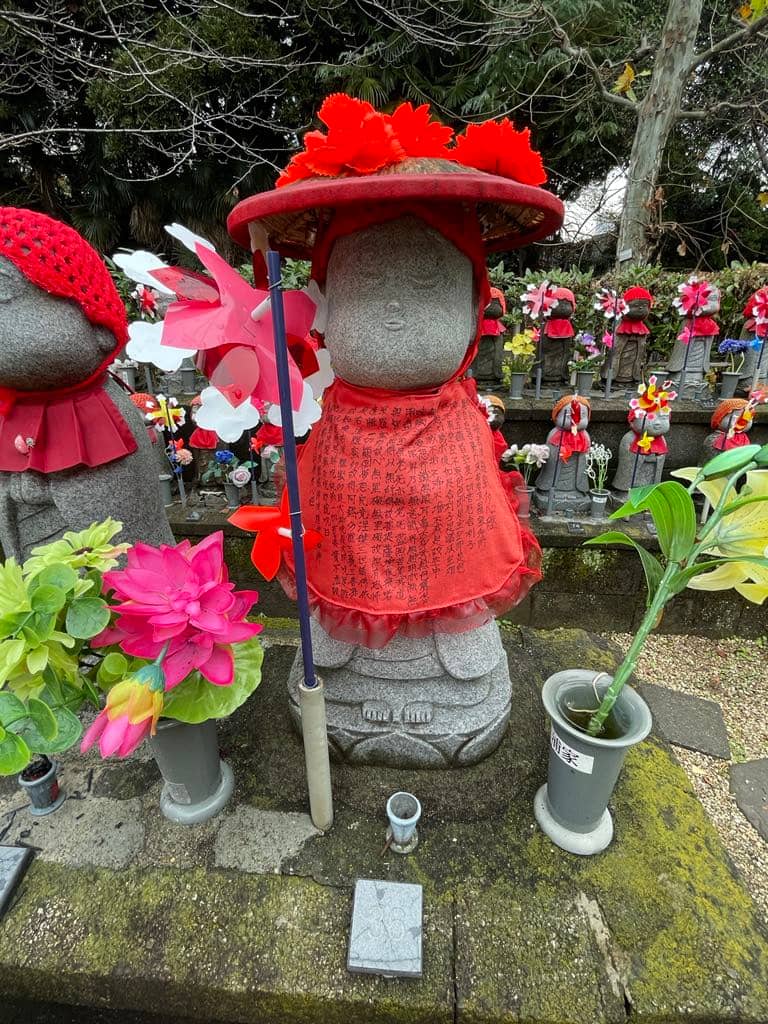 THE statues wear red hats symbolizing protection