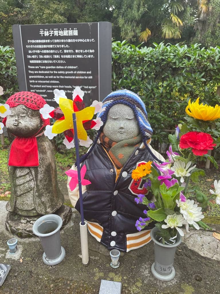 THE statues are adorned with clothing, toys and accessories by their families.