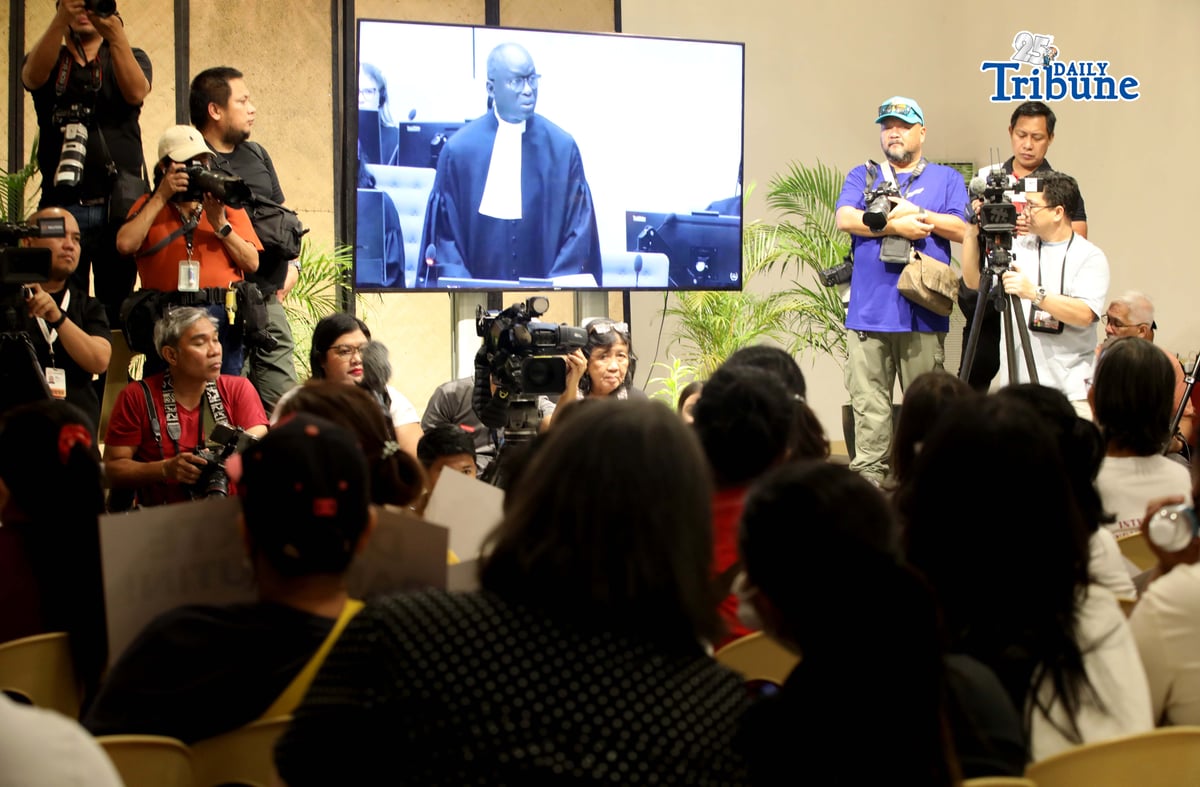 Families of the EJK victims watch the International Criminal Court (ICC) confirmation of charges hearing against former President Rodrigo Duterte in his crimes against humanity case linked to the government’s anti-drug campaign, held at Atencio Libunao Hall in the University of the Philippines, Diliman, Quezon City, on Monday, 23 February 2026.