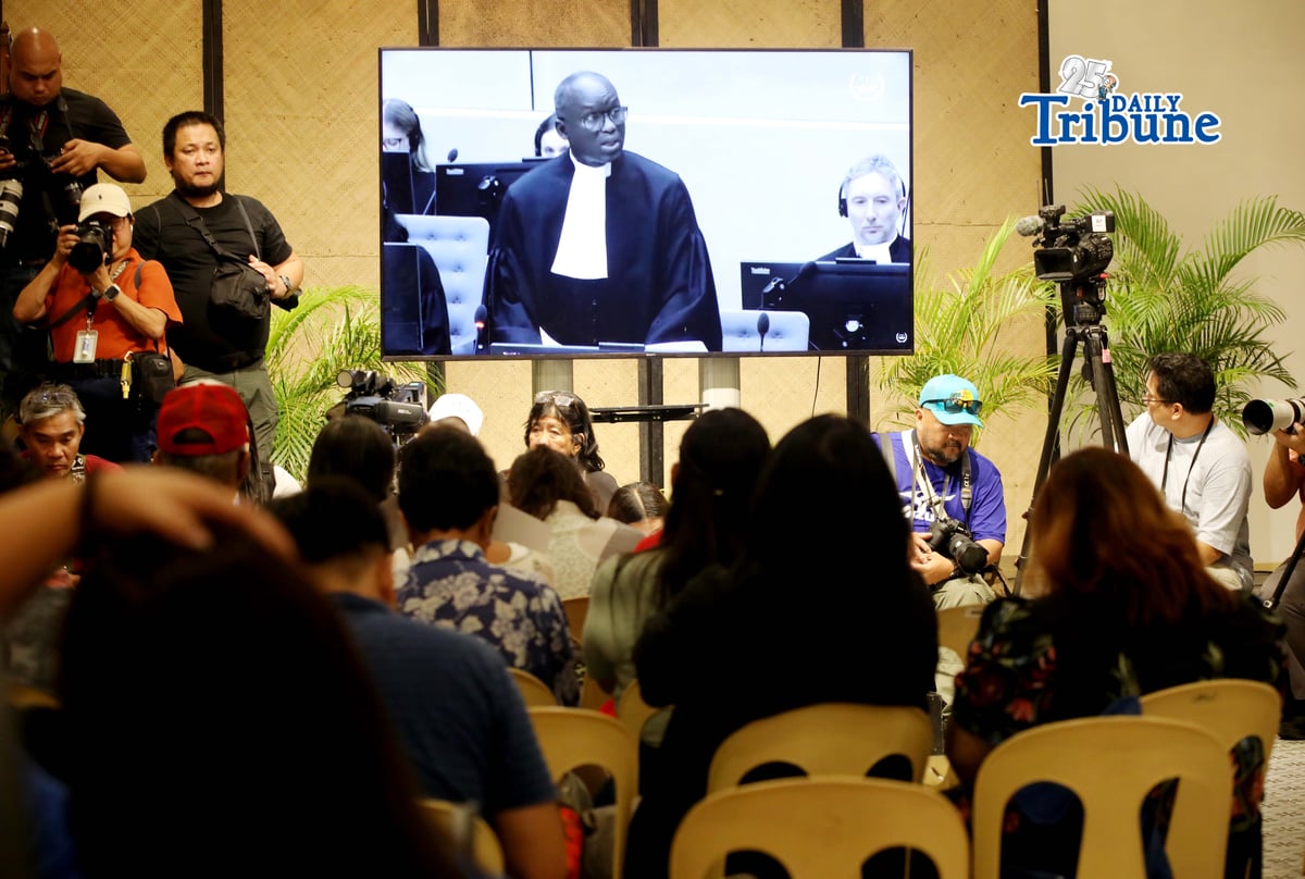 Families of the EJK victims watch the International Criminal Court (ICC) confirmation of charges hearing against former President Rodrigo Duterte in his crimes against humanity case linked to the government’s anti-drug campaign, held at Atencio Libunao Hall in the University of the Philippines, Diliman, Quezon City, on Monday, 23 February 2026.