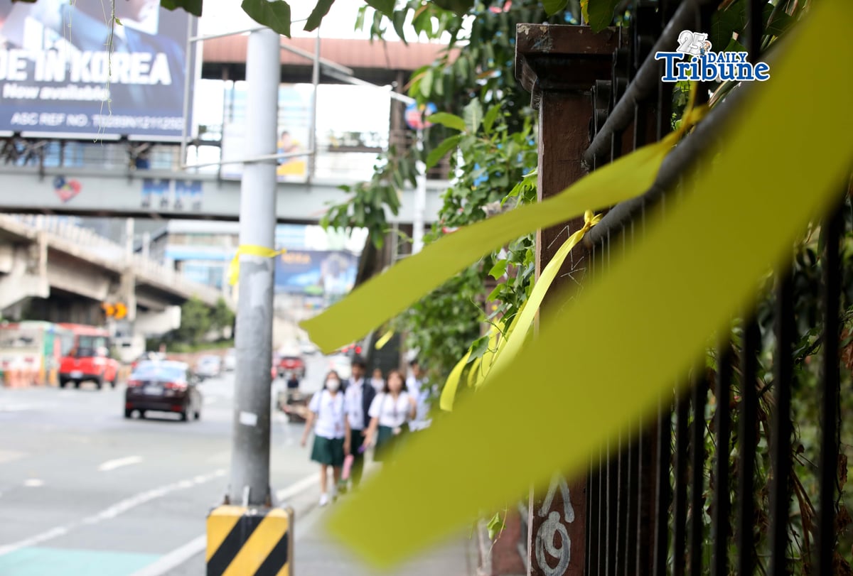 Yellow ribbons were seen tied along EDSA in Quezon City on Monday, 23 February 2026, ahead of the 40th EDSA People Power celebration.