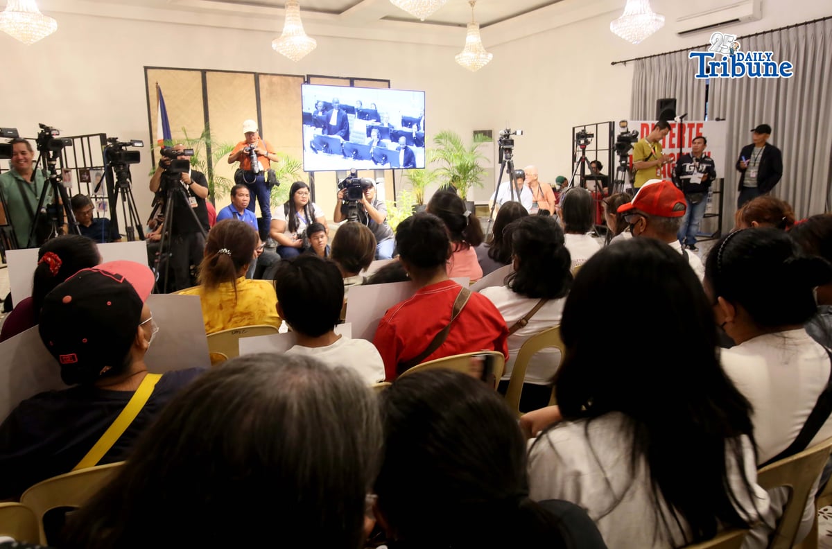 Families of the EJK victims watch the International Criminal Court (ICC) confirmation of charges hearing against former President Rodrigo Duterte in his crimes against humanity case linked to the government’s anti-drug campaign, held at Atencio Libunao Hall in the University of the Philippines, Diliman, Quezon City, on Monday, 23 February 2026.
