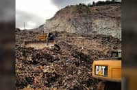 A SECTION of the waste landfill in Rodriguez, Rizal has reportedly collapsed, trapping at least 50 people.
