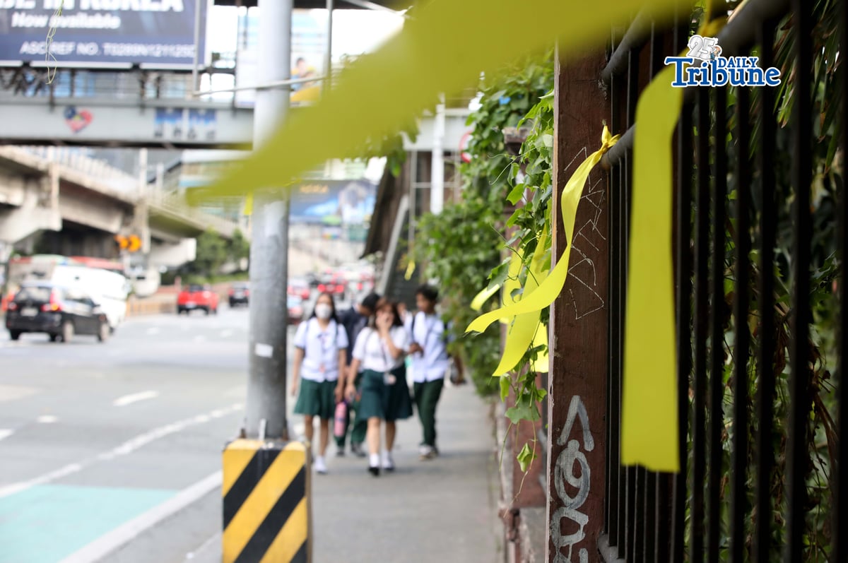 Yellow ribbons were seen tied along EDSA in Quezon City on Monday, 23 February 2026, ahead of the 40th EDSA People Power celebration.