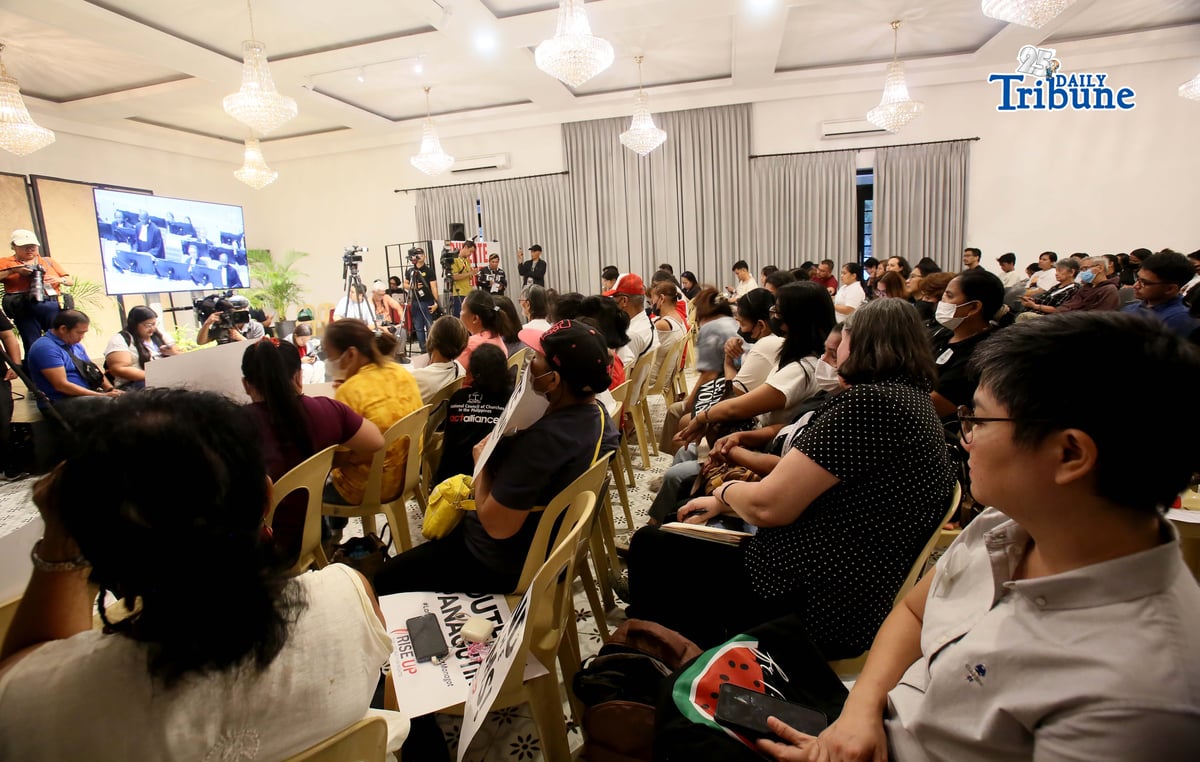 Families of the EJK victims watch the International Criminal Court (ICC) confirmation of charges hearing against former President Rodrigo Duterte in his crimes against humanity case linked to the government’s anti-drug campaign, held at Atencio Libunao Hall in the University of the Philippines, Diliman, Quezon City, on Monday, 23 February 2026.