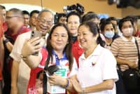 First Lady Louise “Liza” Araneta-Marcos and SBMA Chairman and Administrator Eduardo Jose L. Aliño are all smiles as an official from Zambales takes a groupie with the two during the Lab for All event at the Subic Bay Exhibition and Convention Center (SBECC) in this Freeport on February 24, 2026.