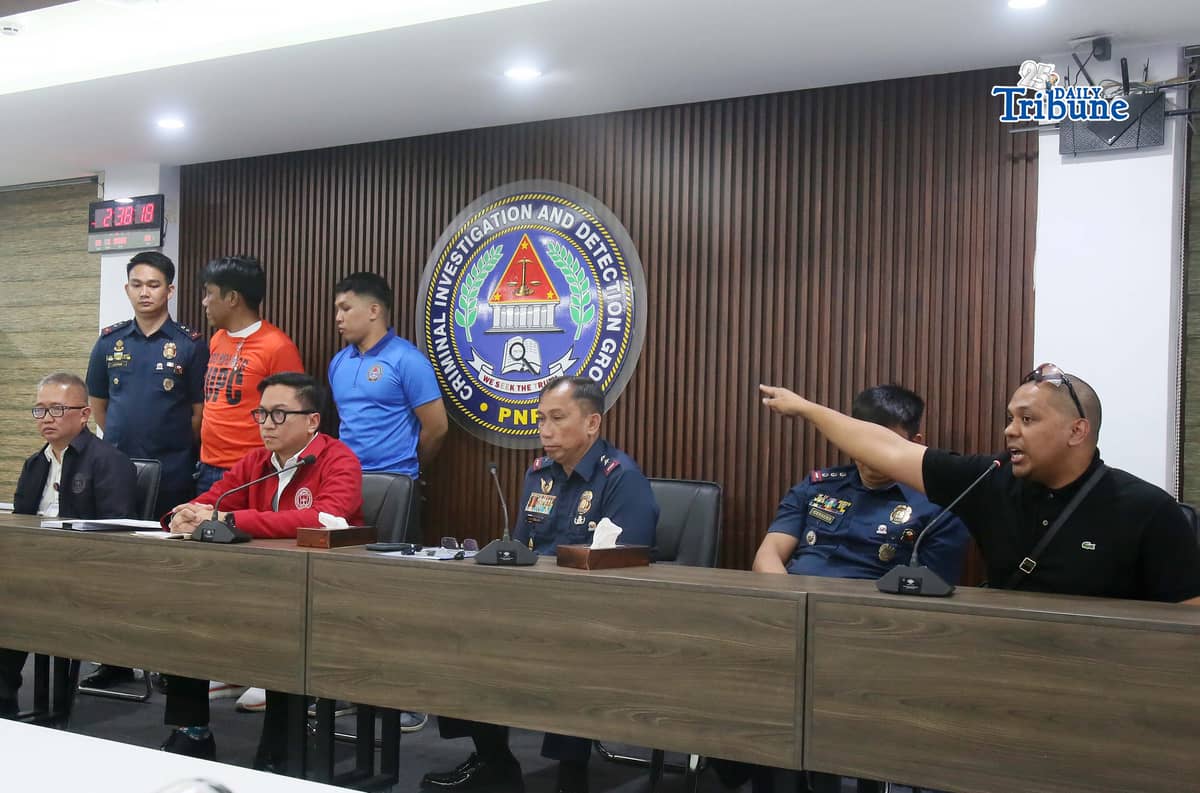 (February 24 2026) National Police Commission (NAPOLCOM) Vice Chairperson and Executive Officer (VCEO) Rafael Calinisan, with CIDG Director, Maj. Gen. Robert Alexander Morico II, present to the media the arrested vlogger Norman Mangusin, also known as Francis Leo Marcos, following his arrest in Pasay. He faces 12 counts of unjust vexation filed by internet personality Mark Jayson Warnakulahewa known as Makagago, during a press conference held at CIDG office in Camp Crame on Tuesday February 24 2026. Photo/Analy Labor