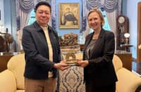SWEDEN Ambassador to the Philippines Anna Ferry (right) receives a miniature of the Arch of the Centuries, a National Cultural Treasure within the University of Santo Tomas campus, from UST Rector Very Rev. Fr. Richard Ang, O.P., Ph.D., during her visit to the Manila university.