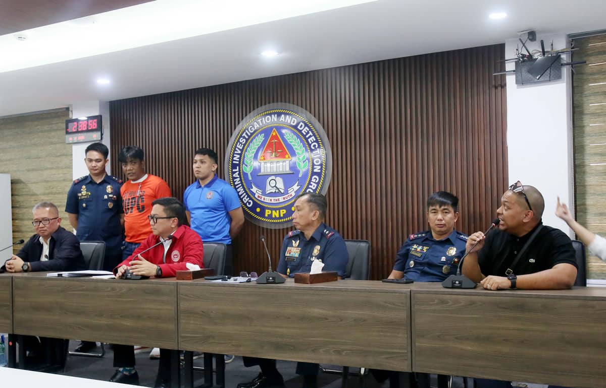 (February 24 2026) National Police Commission (NAPOLCOM) Vice Chairperson and Executive Officer (VCEO) Rafael Calinisan, with CIDG Director, Maj. Gen. Robert Alexander Morico II, present to the media the arrested vlogger Norman Mangusin, also known as Francis Leo Marcos, following his arrest in Pasay. He faces 12 counts of unjust vexation filed by internet personality Mark Jayson Warnakulahewa known as Makagago, during a press conference held at CIDG office in Camp Crame on Tuesday February 24 2026. Photo/Analy Labor