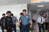 AUTHORITIES from the Quezon City Police District conduct sweep of Hall of Justice after bomb threat report this Friday.
