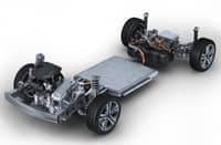 POWERTRAIN layout shows Geely’s EM-I hybrid system with the engine up front, battery pack in the middle, and rear electric components connected by high-voltage lines.