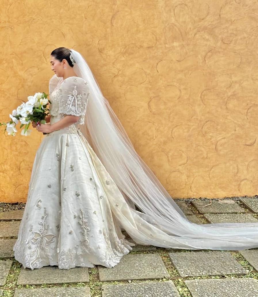 THE bride’s gown was originally her mother’s Ben Farrales gown, which Rajo Laurel re-imagined and restored the masterful