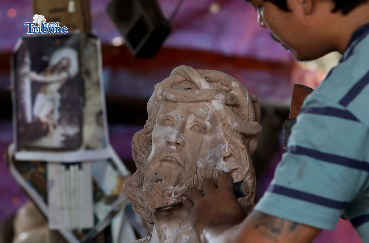 Wood sculpture artist
