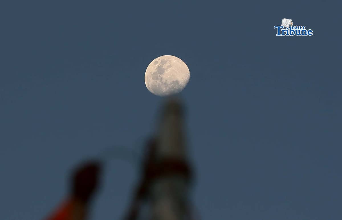 A half moon rises over the shoreline of Arevalo in Iloilo City on Saturday. A total lunar eclipse will occur on 3 March 2026 and will be fully visible in Manila, lasting about 82 minutes from 11:27 p.m. The eclipse, sometimes called a “blood moon,” occurs when the moon turns red.