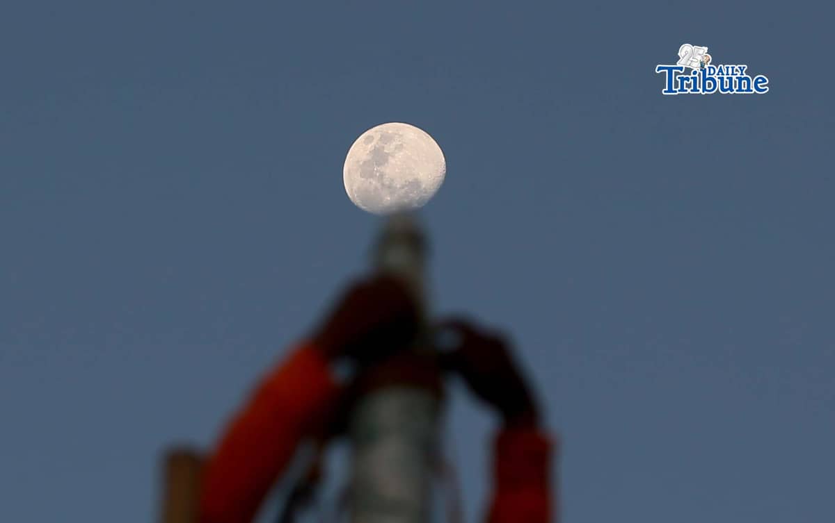 A half moon rises over the shoreline of Arevalo in Iloilo City on Saturday. A total lunar eclipse will occur on 3 March 2026 and will be fully visible in Manila, lasting about 82 minutes from 11:27 p.m. The eclipse, sometimes called a “blood moon,” occurs when the moon turns red.