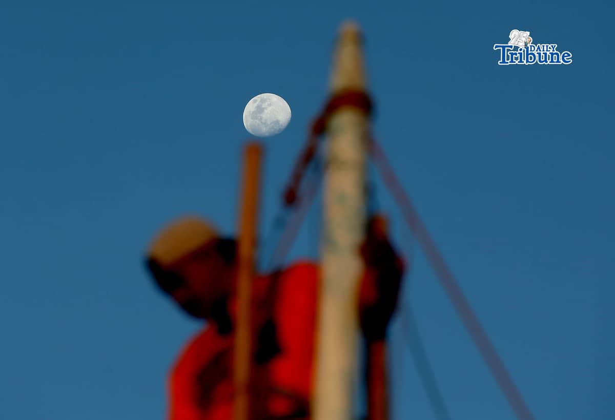 A half moon rises over the shoreline of Arevalo in Iloilo City on Saturday. A total lunar eclipse will occur on 3 March 2026 and will be fully visible in Manila, lasting about 82 minutes from 11:27 p.m. The eclipse, sometimes called a “blood moon,” occurs when the moon turns red.