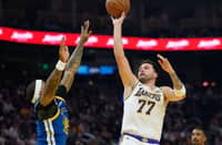 Doncic puts on birthday show