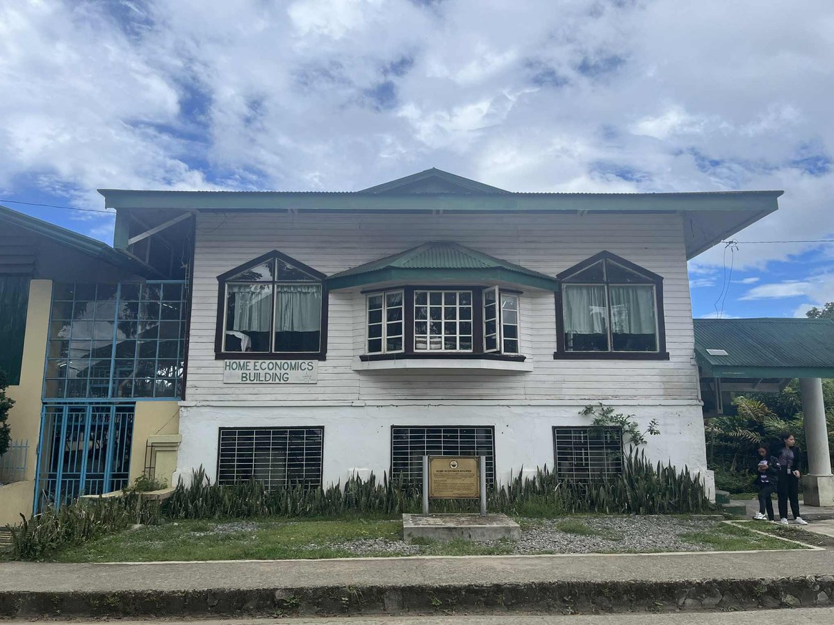 BUILT in 1953 with USAID support, the Home Economics Building later expanded to accommodate weaving classes beneath the elevated structure.